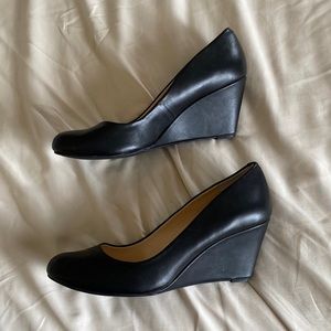 Jessica Simpson Black wedge pumps.  Size 10 medium.  Never worn.  Sorry no box.